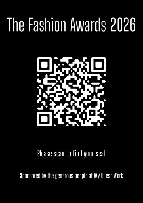 A black sign for The Fashion Awards 2026 with a large white QR code: Please scan to find your seat.